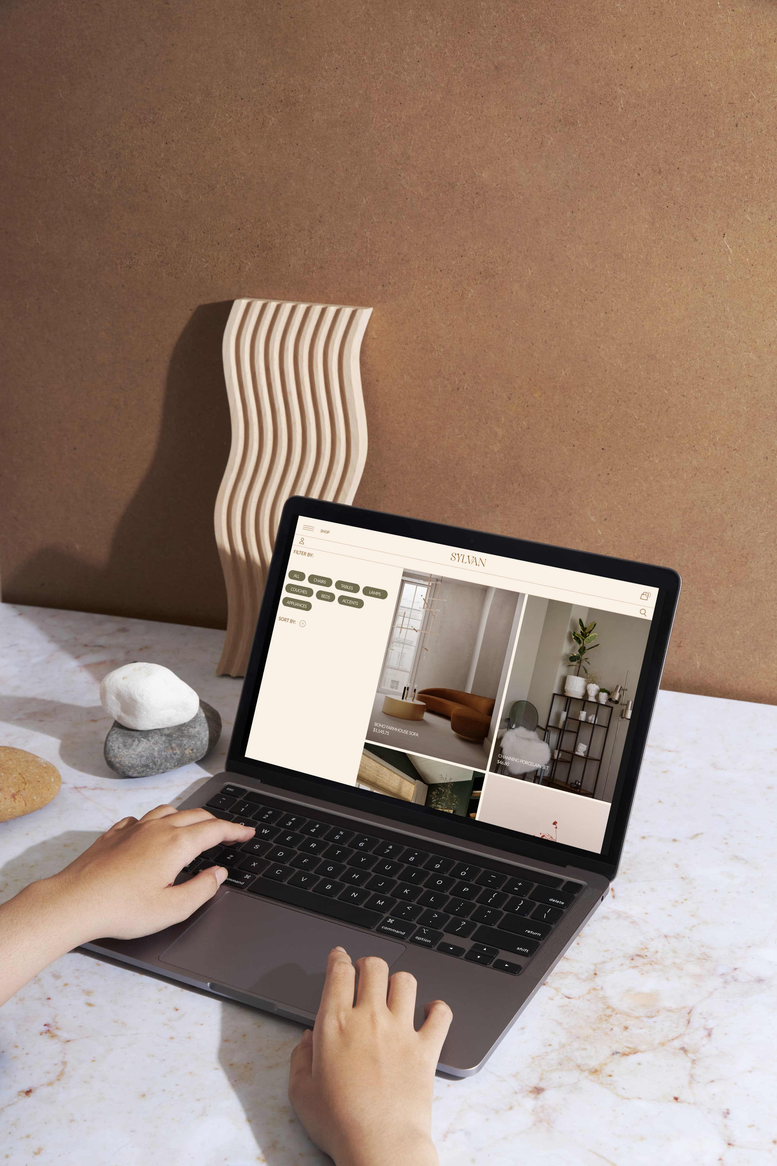 displays of sylvan homepage and detail page in laptop